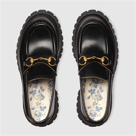 Gucci Mocassins cuir avec Mors et semelle crantée.